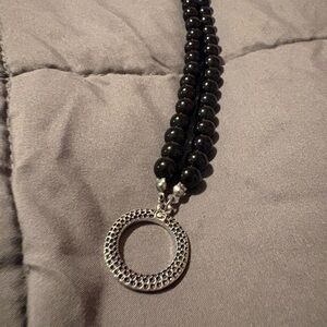 Black Beaded Necklace with Silver Circle Pendant